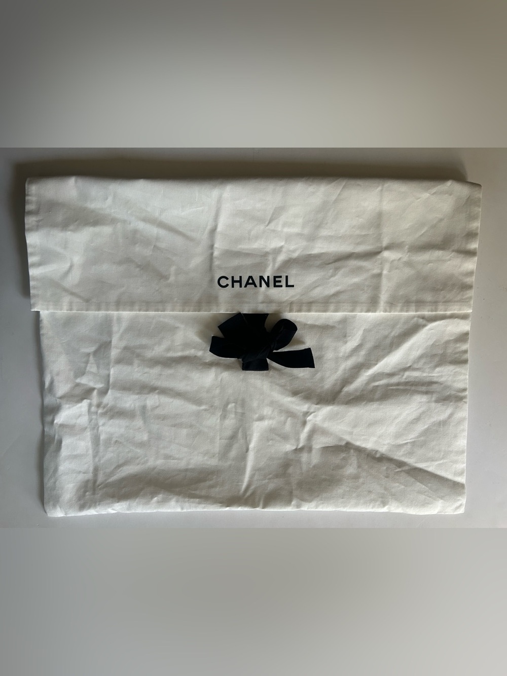 CHANEL White Dust Bag with Black Logo and Tie